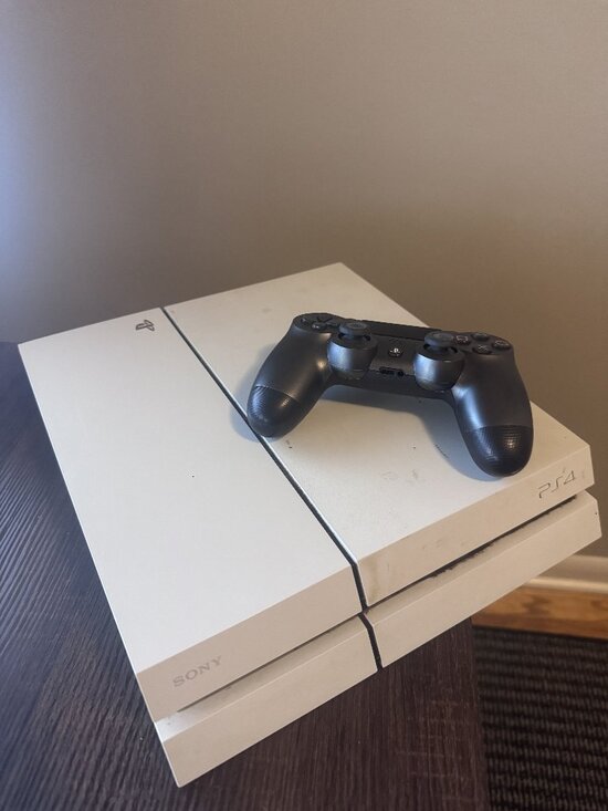 PS4 (WHITE) WITH CORDS AND (8) GAMES - Picture 1 of 3